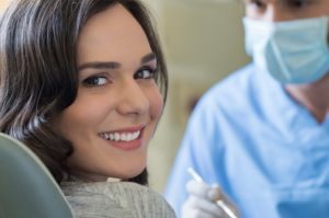 Orthodontist Doing Teeth Straightening on Patient