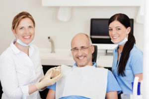 Man having a dental implant