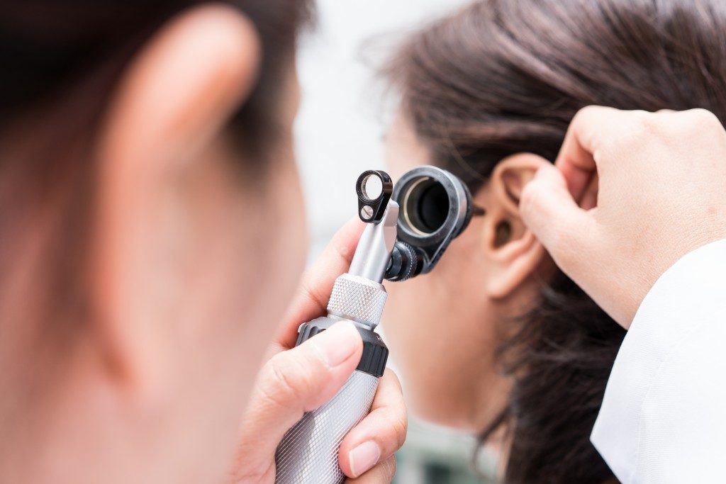 doctor checking the ear