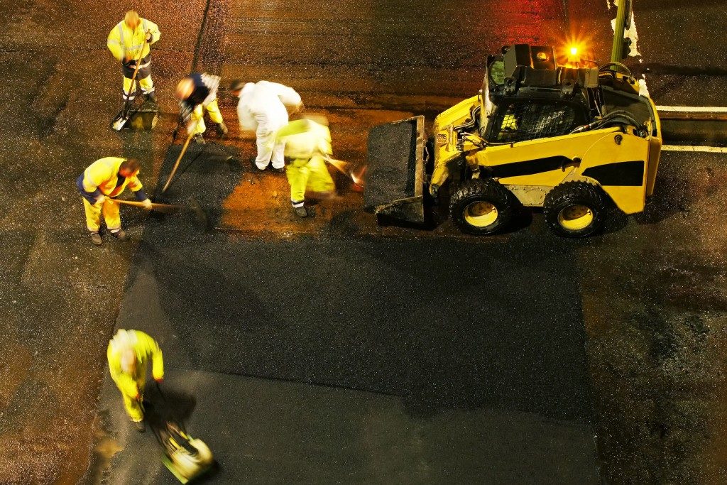 workers fixing road