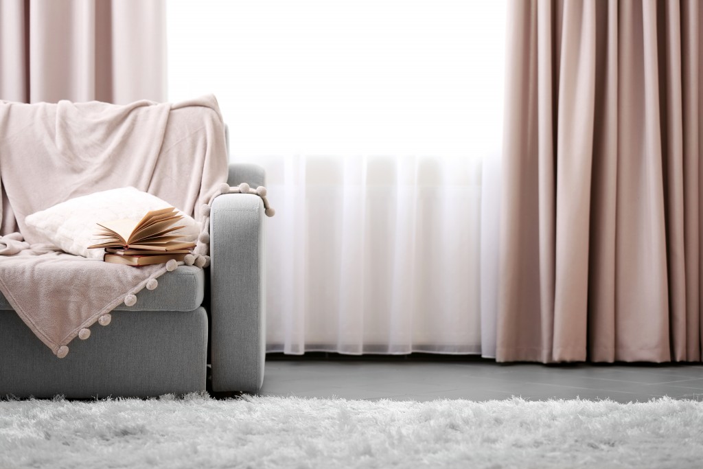 sofa, carpet and curtains