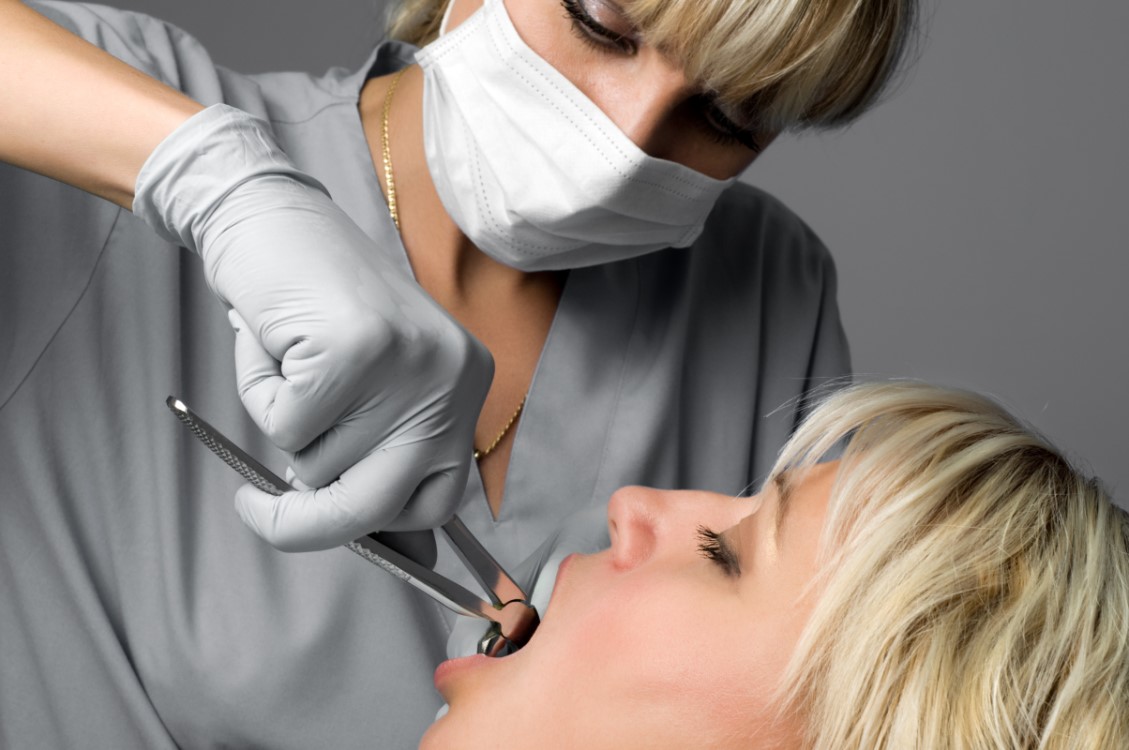 woman doing a dental procedure